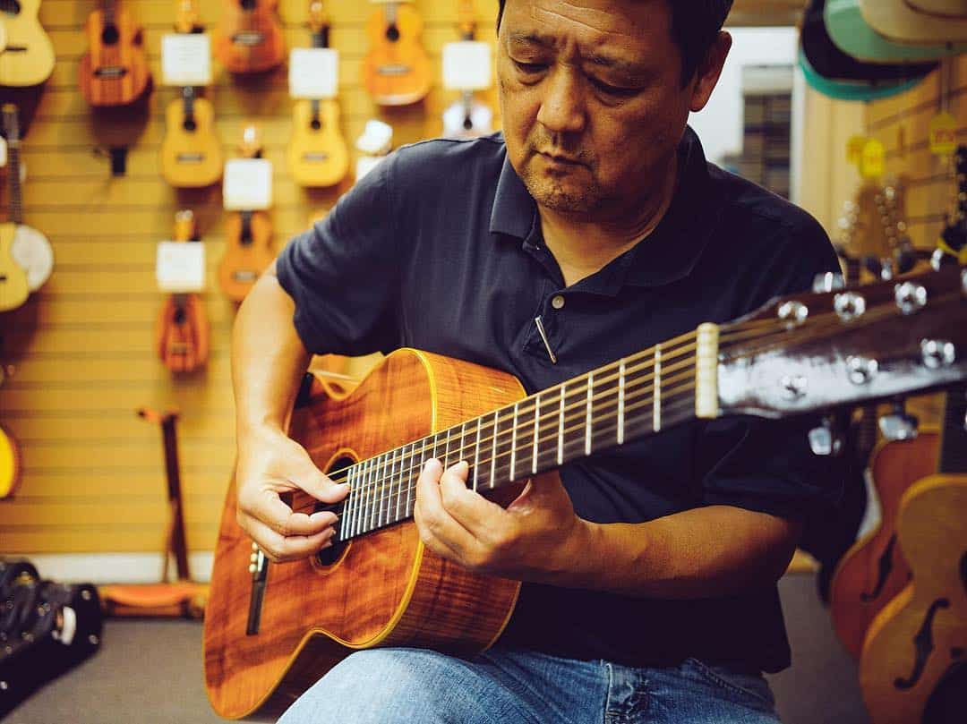 Meet Neil Shimabukuro, co-owner at @island_guitars. On the blog, link in bio, we learn all about his love for music, guitars & creating relationships. #weareward #wardvillage #kakaako #islandguitars #guitar #music #supportlocal #shoplocal