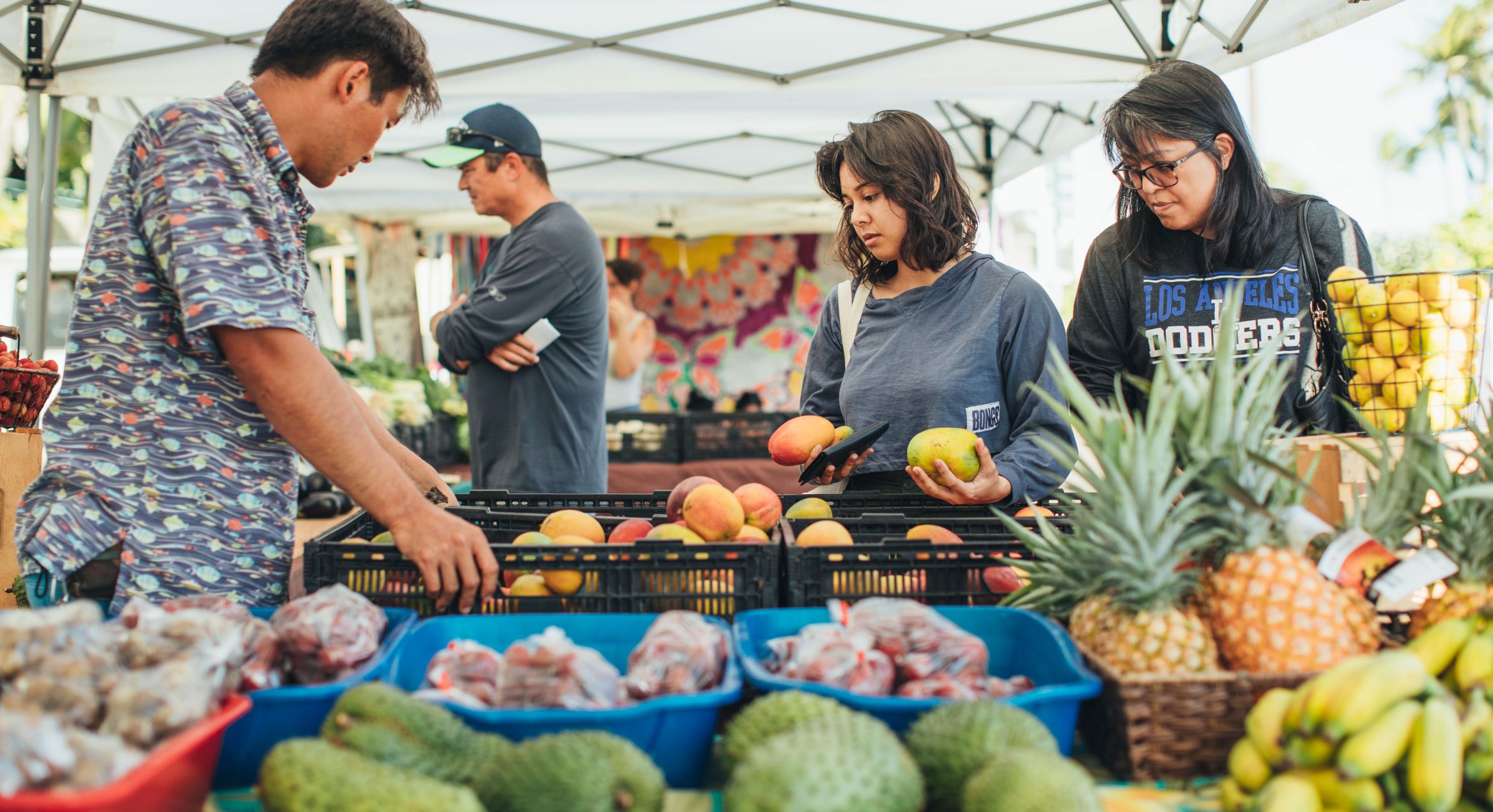 Locals browsing the produce at the farmer's market