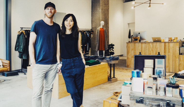 Two people standing in a store