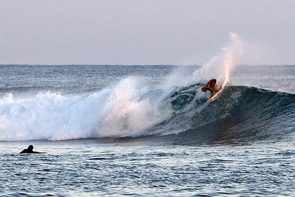 Person surfing on a wave at Ala Moana