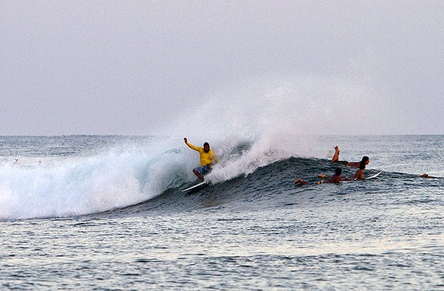 Person surfing on a wave at Ala Moana