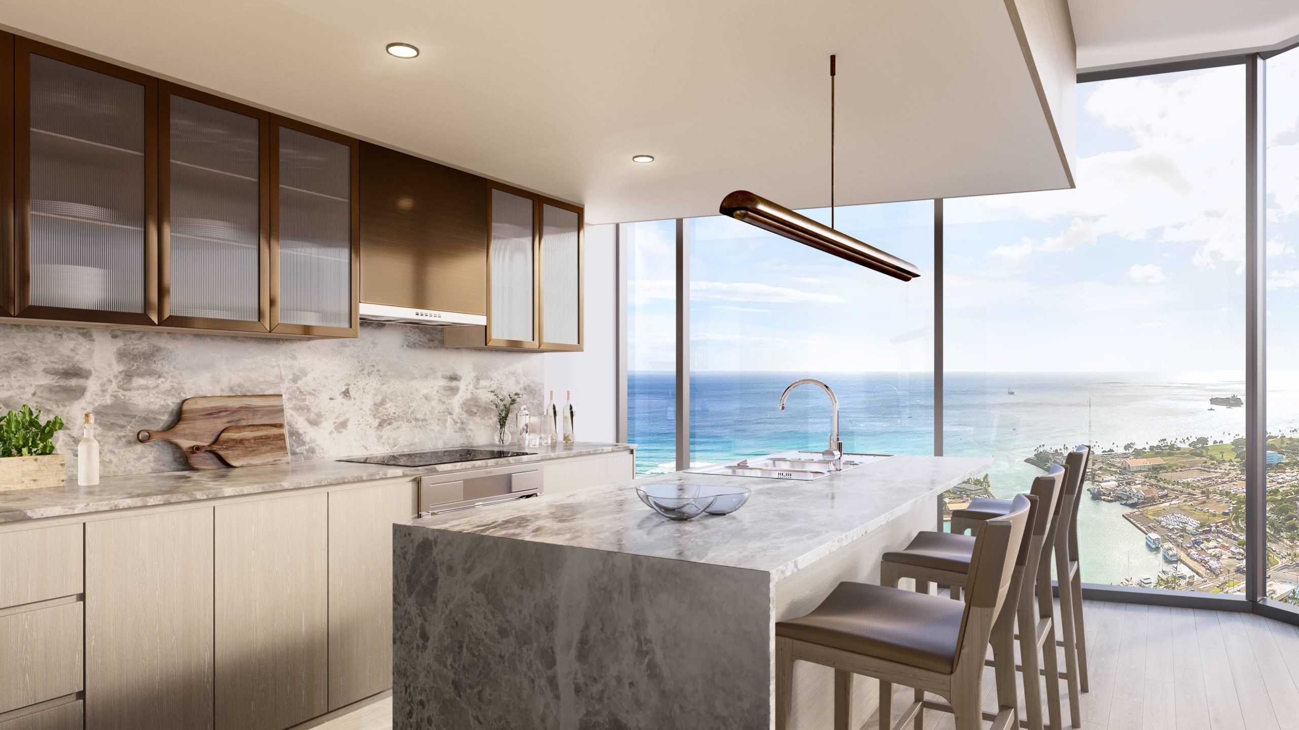 Corner kitchen with neutral countertops and cabinetry and an ocean view