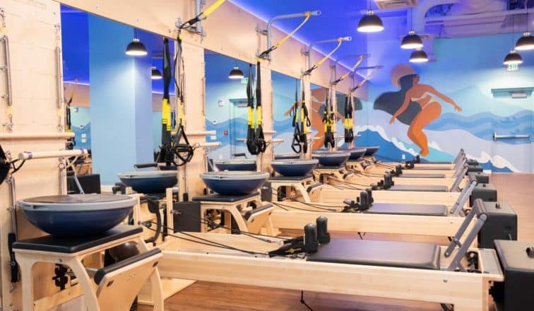 Pilates equipment in Club Pilates workout studio space.