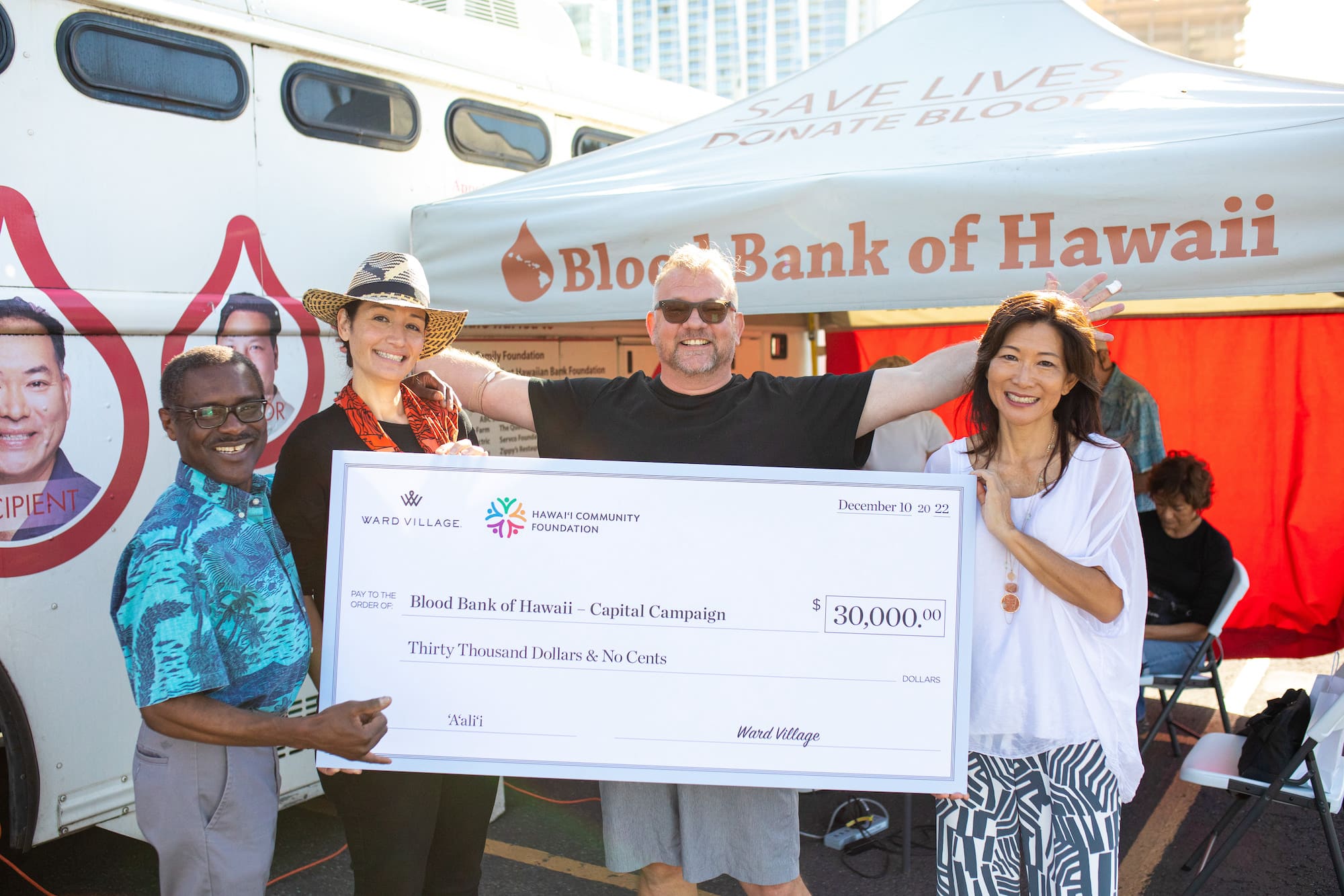 Ward Village presenting a $30,000 check to the Blood Bank of Hawai‘i during their pop-up Blood Drive.
