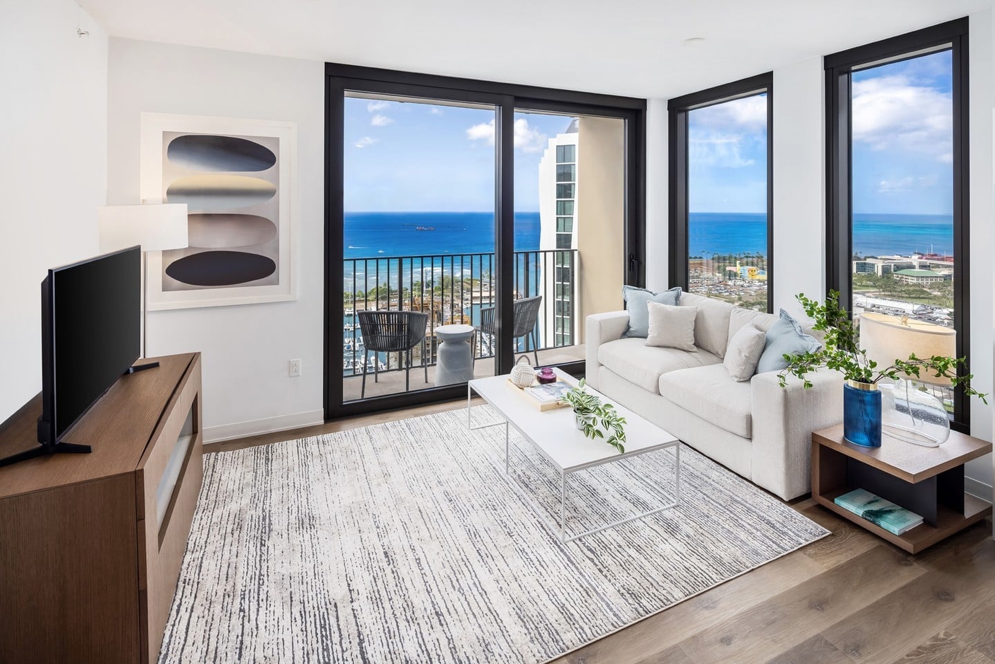 At ʻAʻaliʻi, floor-to-ceiling windows showcase sweeping views and the beauty of Hawai‘i. Learn more about these furnished, move-in ready residences at www.aaliiwardvillage.com.