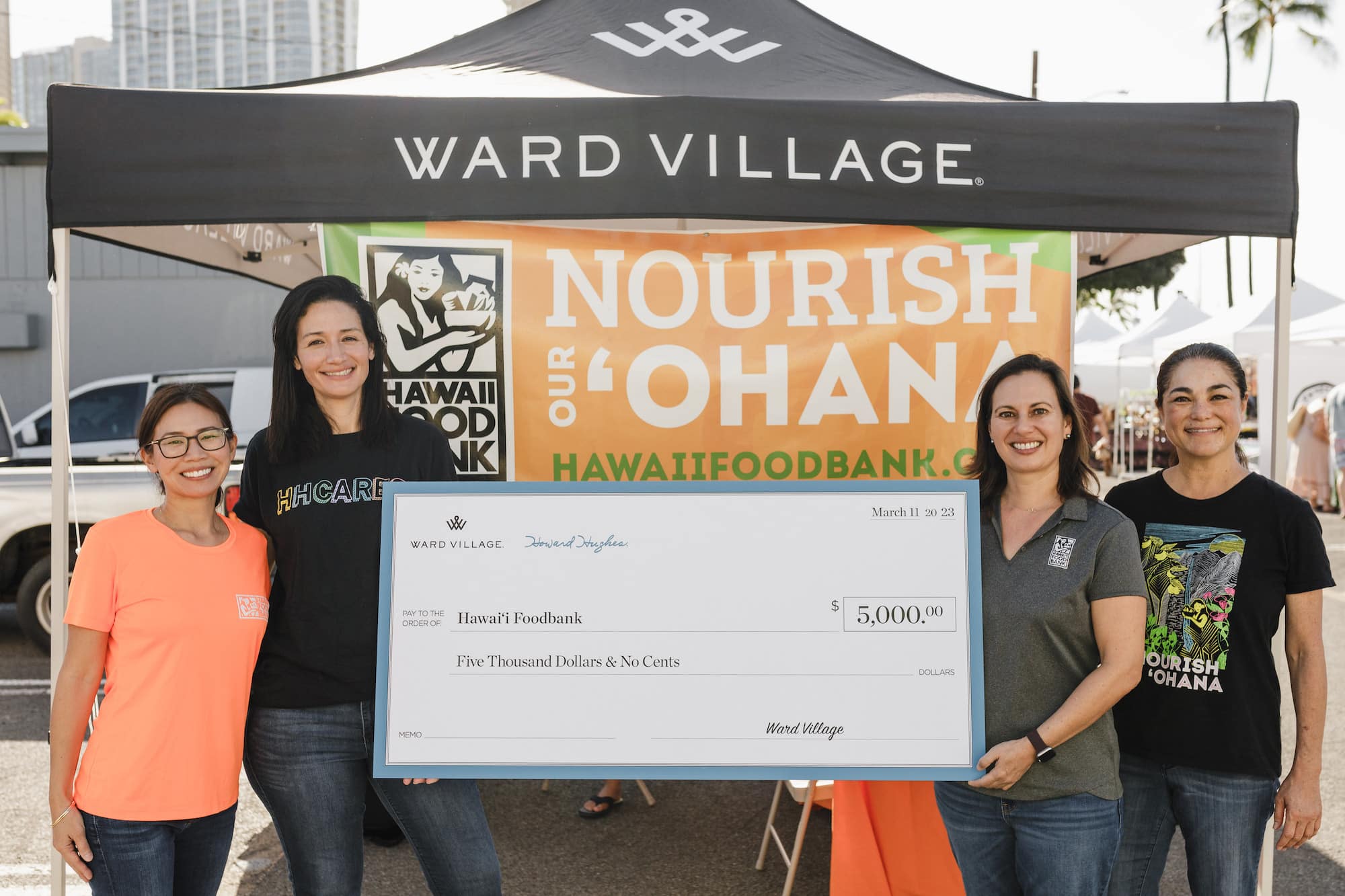 Check presentation of $5,000 by Ward Village staff to the Hawaii Foodbank.