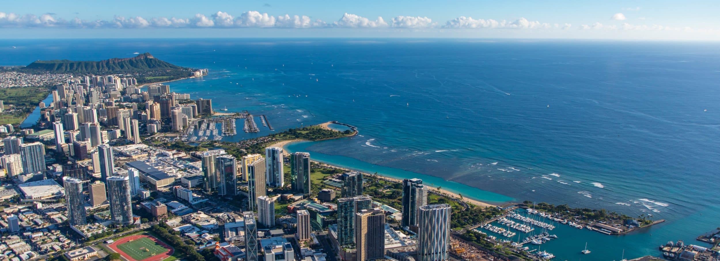Aerial shot of Waikiki and Diamond head and the buildings in between