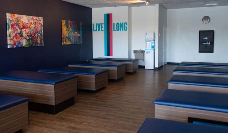 Interior shot of a fitness room with stretch tables